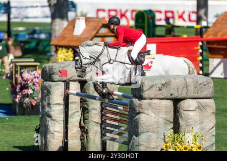 Géraldine Straumann of Switzerland with Long John Silver 3 during the