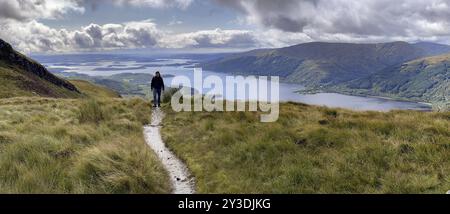 Hikers on the way to Ben Lomond, view of Loch Lomond, Loch Lomond and the Trossachs National Park, Scotland, Great Britain Stock Photo