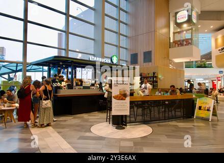 Starbucks coffee shop inside the Rio Shopping shopping mall with an open seating area Valladolid Castile and Leon Spain Stock Photo