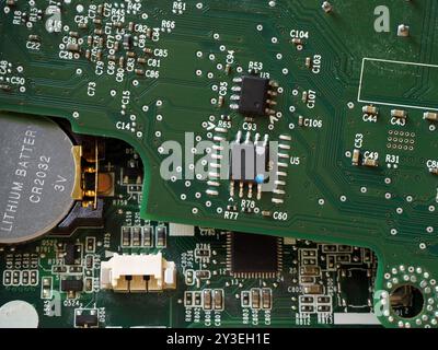 Multi-layer printed circuit board or printed wiring board. Battery-backed electronic boards. Stock Photo