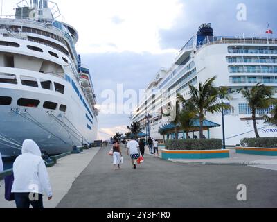 Nassau, Bahamas - April 15, 2008: cruise ships, including the Norwegian Gem, are docked at the Nassau Cruise Port. Stock Photo