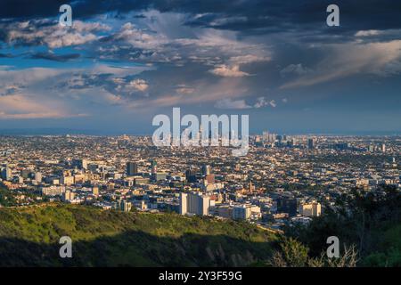 City of Los Angeles cityscape panorama after storm. Downtown LA skyline shot at sunset from Hollywood Hills. Stock Photo