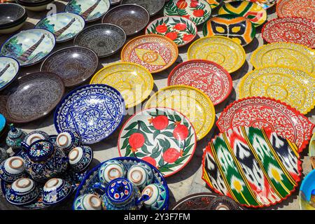 Bright and Colorful Plates in the Oriental Uzbek Pattern Style on the local market, Uzbekistan Stock Photo