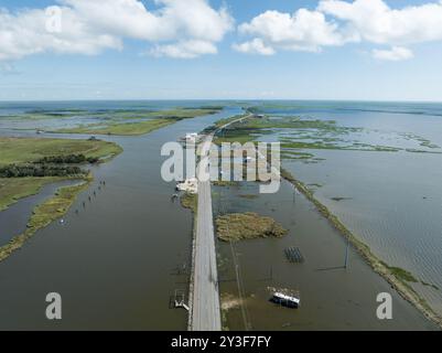 Aerial view of flooded highway through Leeville, Louisiana, in the aftermath of Hurricane Francine's devastation. Stock Photo