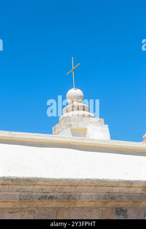 View from behind of the cristian cross symbol on top of The Muhraka Monastery located on the Mount Carmel, near the Druze village of Daliyat el-Carmel Stock Photo