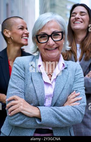Portrait diverse happy professionals business women. Leadership lady looking smiling at camera Stock Photo