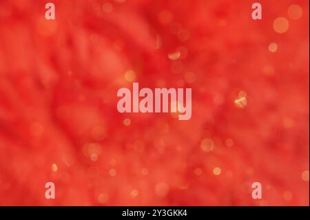 Red abstract blurred background with yellow defocus lights. Stock Photo