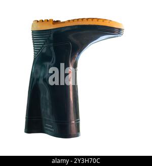 Side view of one side of black gumboots or rubber boots is isolated on white background with clipping path. Stock Photo