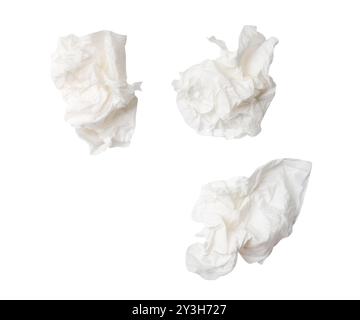 Top view set of screwed or crumpled white tissue paper balls after use is isolated on white background. Stock Photo