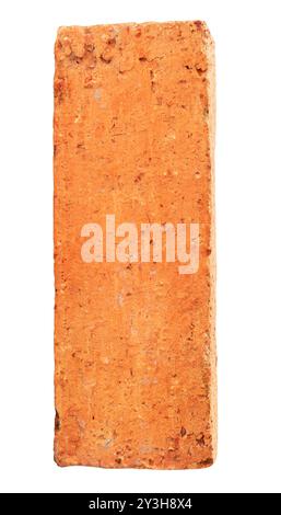 Single cracked old red or orange brick is isolated on white background with clipping path. Stock Photo