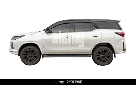 Side view of white SUV sports car is isolated on white background with clipping path. Stock Photo