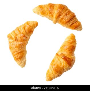 Top view set of gold or brown croissants is isolated on white background with clipping path. Stock Photo