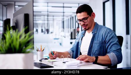 Business Accountant Accountant And Bookkeeper. Invoice And Calculator Stock Photo
