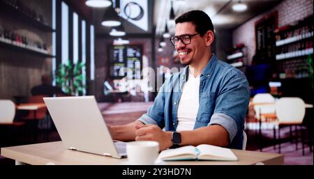 Excited Business Analyst Using Laptop Computer And Celebrating Win Stock Photo