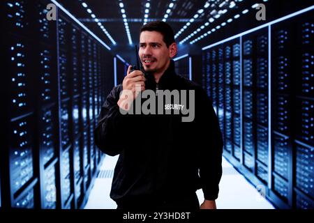 Security Guard Officer In Data Center With Cloud Computing Technology Stock Photo