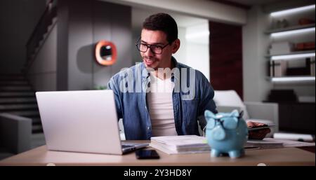 Calculating Finances Online Using Laptop. Tax,Budget And Bills Stock Photo