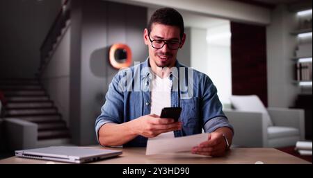 Remote Check Deposit Taking Photo With Mobile Phone Stock Photo