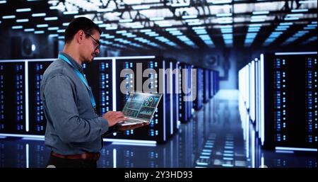 Analyst Engineer In Cloud Data Center Using Computer Stock Photo