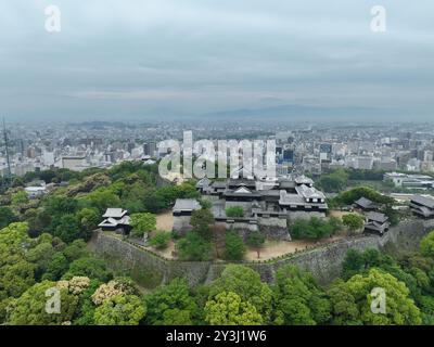 Aerial Image of Matsuyama Castle on an overcast day. Stock Photo