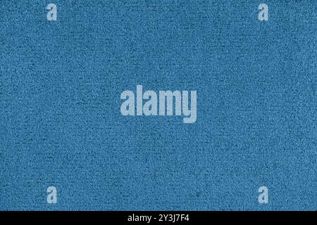 Plain blue colored microfiber detail texture. Structure of suede leather upholstery closeup, macro. Wallpaper, backdrop, textile background. Stock Photo