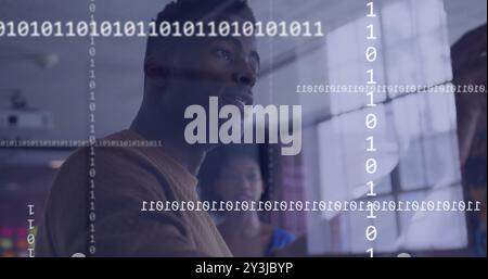 Image of binary coding over diverse colleagues discussing work in office Stock Photo