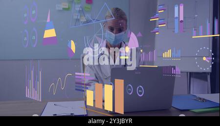 Image of diagrams and data processing over caucasian female doctor using laptop in office Stock Photo