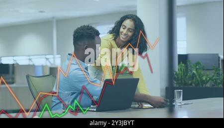 Image of financial data processing over diverse colleagues discussing work in office Stock Photo