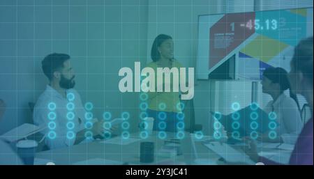 Business presentation with data visualization image over diverse team in meeting room Stock Photo