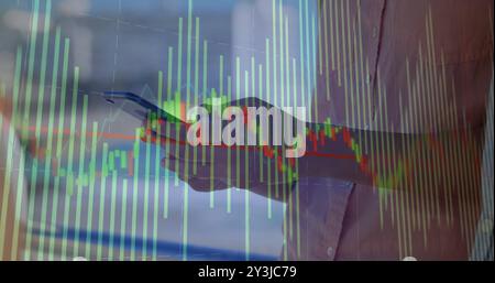 Image of data processing and diagrams over caucasian woman using smartphone Stock Photo