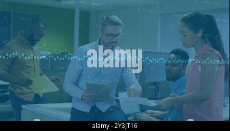 Image of financial data processing over diverse business people in office Stock Photo