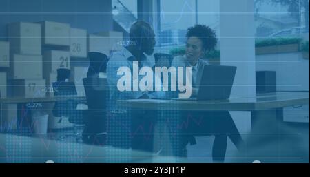 Image of financial data processing over diverse business people using laptop Stock Photo