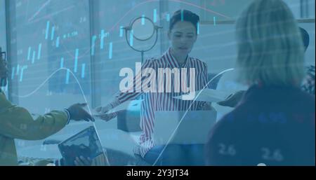 Image of financial data processing over diverse business people in office Stock Photo