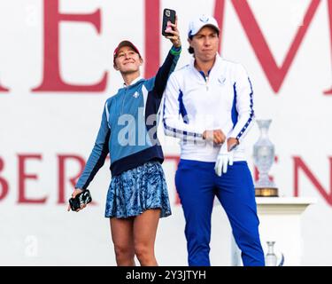 Gainesville, Va, USA. 14th Sep, 2024. Team USA's NELLY KORDA takes a selfie while team Europe's CARLOTA CIGANDA prepares to tee off on the first tee for Day two of the 2024 Solheim Cup. (Credit Image: © Robert Blakley/ZUMA Press Wire) EDITORIAL USAGE ONLY! Not for Commercial USAGE! Credit: ZUMA Press, Inc./Alamy Live News Stock Photo