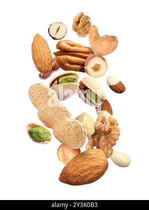 Pecan and other nuts in air on white background Stock Photo