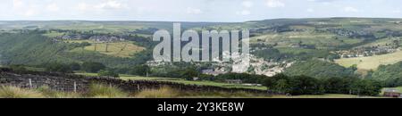 Panoramic view of the calder valley showing the town or hebden bridge, mytholmroyd village and surrounding yorkshire dales countryside Stock Photo