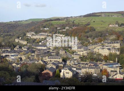 Panoramic aerial view of the town of hebden bridge in west yorkshire showing the streets houses and old mill buildings set in the surrounding pennine Stock Photo