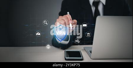 VPN security concept with businessman. Highlights digital protection, online privacy, and secure networks. Perfect for cybersecurity, data encryption Stock Photo