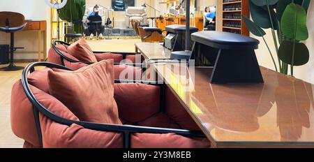 interior of a womens beauty salon with armchairs and tables Stock Photo