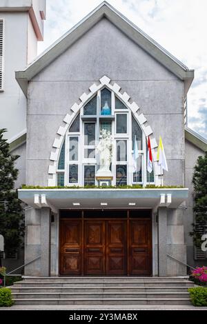 View of the Cathedral of Christ the King. Facade of Bac Thanh Church in Nha Trang Vietnam. Catholic Church in Southeast Vietnam-Travel photo, street v Stock Photo