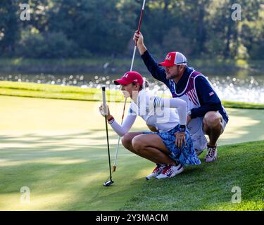 Gainesville, Va, USA. 14th Sep, 2024. Team USA's NELLY KORDA and her caddy line up a putt during the morning foursome matches on day two of the 2024 Solheim Cup. (Credit Image: © Robert Blakley/ZUMA Press Wire) EDITORIAL USAGE ONLY! Not for Commercial USAGE! Stock Photo