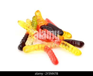 Pile of gummy worms isolated on white background. Chewy kids snack treat Stock Photo