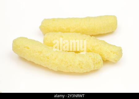 Three finger long corn puffs isolated on white backround Stock Photo