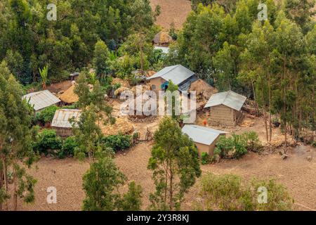 Aerial view to traditional ethiopian local village houses hidden in the wood in Lasla mountains, Lalibela, Amhara Region, Ethiopia. Stock Photo