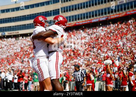 Madison, WI, USA. 14th Sep, 2024. Alabama Crimson Tide running back Jam Miller (26) celebrates his 34 yard touchdown run with tight end CJ Dippre (81) in the third quarter of the NCAA Football game between the Alabama Crimson Tide and the Wisconsin Badgers at Camp Randall Stadium in Madison, WI. Darren Lee/CSM (Credit Image: © Darren Lee/Cal Sport Media). Credit: csm/Alamy Live News Stock Photo