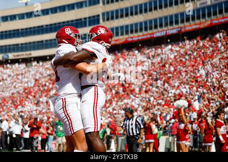 Madison, WI, USA. 14th Sep, 2024. Alabama Crimson Tide running back Jam Miller (26) celebrates his 34 yard touchdown run with tight end CJ Dippre (81) in the third quarter of the NCAA Football game between the Alabama Crimson Tide and the Wisconsin Badgers at Camp Randall Stadium in Madison, WI. Darren Lee/CSM/Alamy Live News Stock Photo