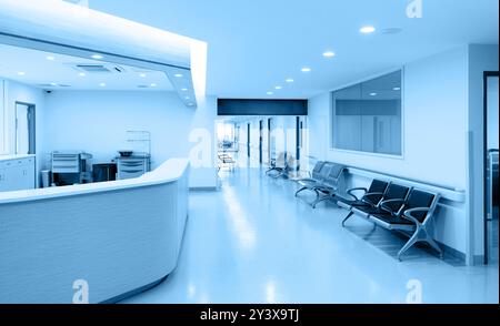 Empty nurses station and corridor in a hospital Stock Photo