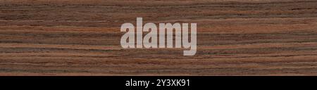 Cascading waves of caramel and coffee dance across the robust rosewood veneer's surface Stock Photo