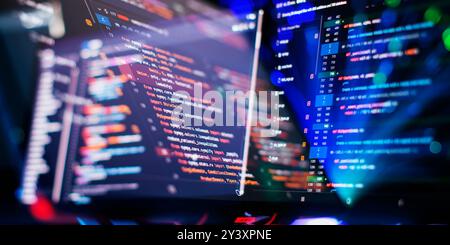 Modern tech. PHP syntax highlighted. Writing programming functions on laptop. Stock Photo