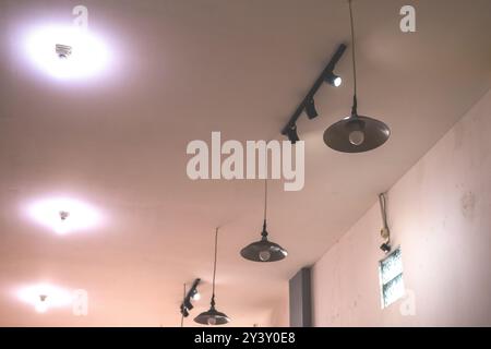 Decorative modern room lamp hanging on ceiling. Hanging lamp, pendant lamp, chandelier lamp photo Stock Photo