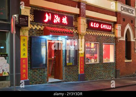 Red Chilli House at night, a Southern Chinese restaurant in Chinatown on Little Bourke Street in the Melbourne CBD, Victoria, Australia. Stock Photo